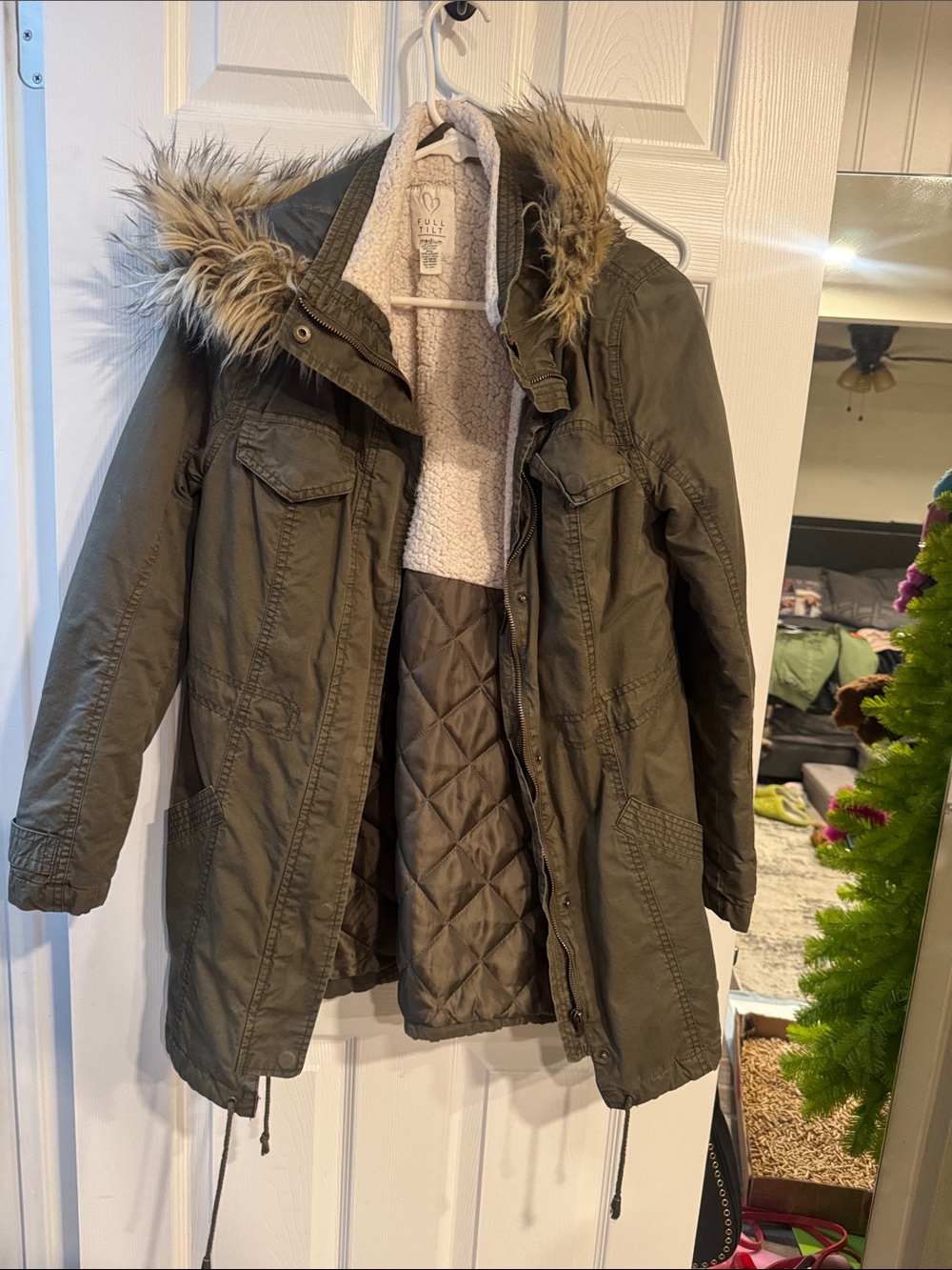 Green anorak jacket